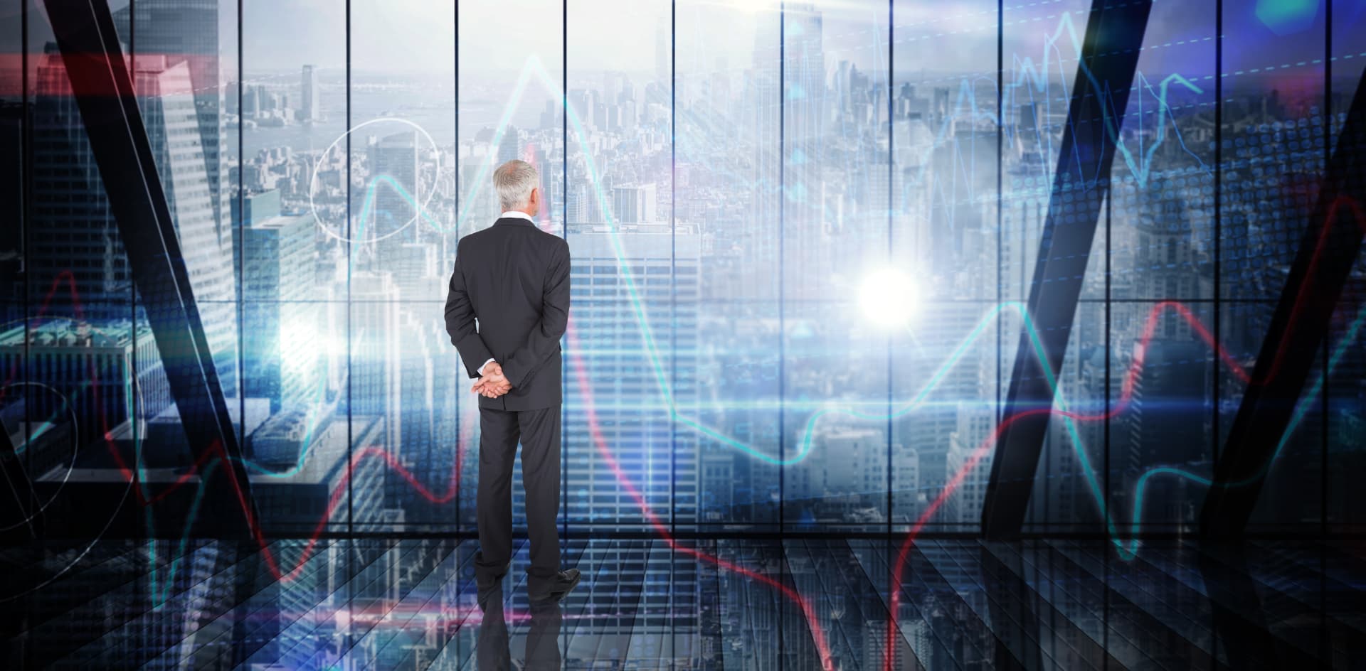 Executive overlooking a financial district skyline with market data overlays